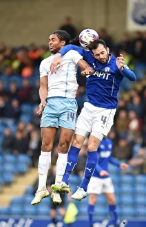 Images Dated 2015 March: Battle for the Ball: Hird vs. Samuel in Sky Bet League One Clash at Proact Stadium