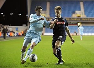 Images Dated 1st November 2011: Battle for the Ball: Jutkiewicz vs. Ward - Coventry City vs. Millwall in Npower Championship