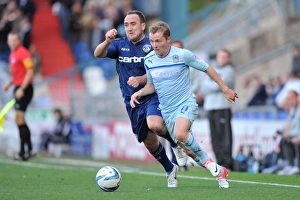 Battle for the Ball: Lee Croft vs. Gary McSheffrey - Npower League One Clash at Oldham Athletic's Boundary Park