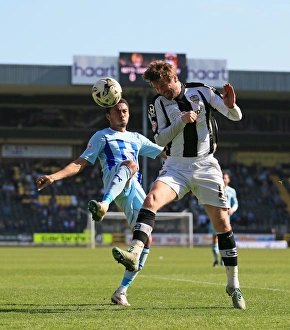 Battle for the Ball: McCourt vs. Ward in Sky Bet League One Clash at Meadow Lane