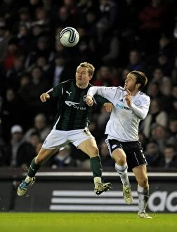Images Dated 14th January 2012: Battle for the Ball: McSheffrey vs. Brayford in Coventry City's Championship Showdown at Derby