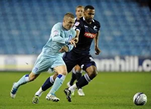Images Dated 1st November 2011: Battle for the Ball: McSheffrey vs. Trotter in the Intense Npower Championship Clash between
