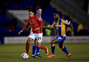 Season 2015-16 Prints: Battle for the Ball: Murphy vs. Ogogo in Intense Sky Bet League One Rivalry
