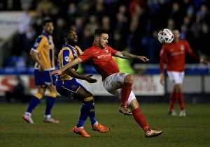 Sky Bet League One - Shrewsbury Town v Coventry City - Greenhous Meadow Collection: Battle for the Ball: Ogogo vs. Armstrong - Coventry City vs. Shrewsbury Town Rivalry in Sky Bet