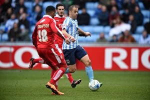 Images Dated 19th March 2016: Battle of the Midfield: Joe Cole vs. Louis Thompson - Coventry City vs Swindon Town