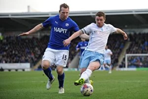 Images Dated 14th March 2015: Battle of the Midfield Maestros: Ritchie Humphreys vs. John Fleck in Sky Bet League One Clash at