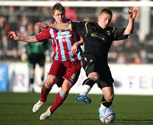 Images Dated 2009 December: Battle for Supremacy: McCann vs. Eastwood in Championship Clash at Glanford Park