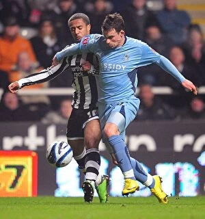 Images Dated 17th February 2010: Battle for Supremacy: McIndoe vs Routledge in the Championship Clash between Coventry City