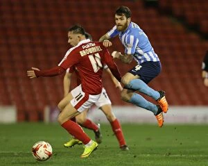Sky Bet League One - Barnsley v Coventry City - Oakwell Collection: Battleground Oakwell: A Clash of Midfield Titans - Josh Brownhill vs. Romain Vincelot