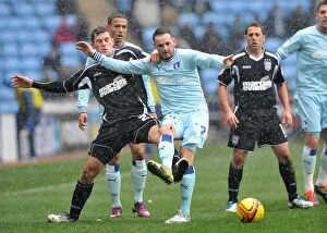 Images Dated 4th February 2012: Battling for Championship Supremacy: Coventry City vs. Ipswich Town