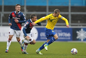 Images Dated 2013 January: Battling for Control: Chantler vs. Baker in Npower League One Clash