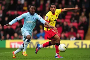 17-03-2012 V Watford, Vicarage Road Prints: Battling for Control: Mariappa vs. Nimely in the Npower Championship Showdown