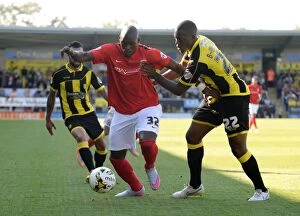 Images Dated 6th September 2015: Binnom-Williams vs. Fortune: A Fierce Tackle in Sky Bet League One Clash between Burton Albion