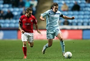 Images Dated 1st January 2013: Blair Adams Outmaneuvers Jon Taylor: Coventry City vs. Shrewsbury Town in Npower League One Clash