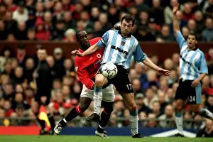 Images Dated 2001: Breen vs Yorke: A Football Battle at Old Trafford - Coventry City vs Manchester United (14-04-2001)
