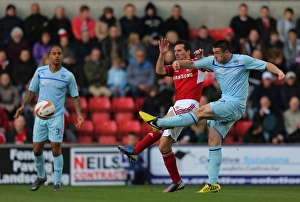 Images Dated 2012 October: Callum Ball vs. Tommy Miller: A Battle at the County Ground - Intense Goal-line Clash in Swindon Town vs