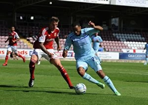 Images Dated 11th August 2013: Callum Wilson Outmaneuvers Aden Flint: Coventry City's Thrilling Moment vs