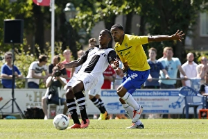 Images Dated 2013 July: Callum Wilson vs. Milano Koenders: A Pre-Season Rivalry at Polman Stadium (July 20)