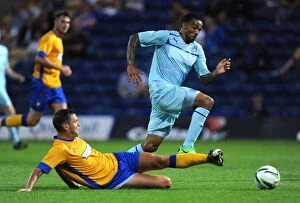 Friendly : Mansfield Town v Coventry City : Field Mill : 26-07-2013 Collection: Callum Wilson's Agile Escape: Overcoming John Dempster in the Mansfield Town Friendly (July 26)
