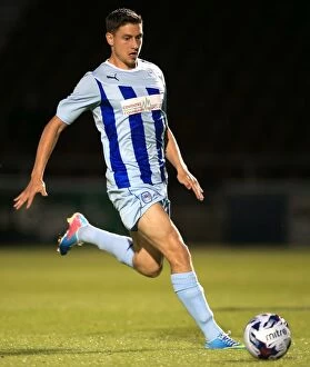 Images Dated 13th August 2014: Capital One Cup First Round: Shaun Miller's Thrilling Performance at Sixfields Stadium - Coventry