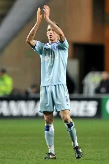 Images Dated 31st December 2011: Carl Baker in Action for Coventry City Against Brighton & Hove Albion at Ricoh Arena (December 31)