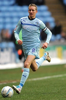 Images Dated 2013 January: Carl Baker in Action: Coventry City vs Oldham
