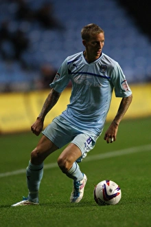 Images Dated 2012 August: Carl Baker Fights for Coventry City in Capital One Cup Clash Against Birmingham City at Ricoh Arena