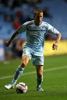Images Dated 28th August 2012: Carl Baker Fights for Coventry City in Intense Capital One Cup Clash vs