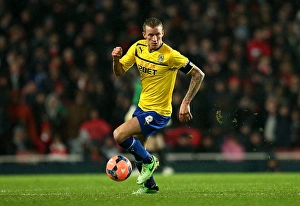 Images Dated 2014 January: Carl Baker vs. Arsenal: Coventry City's Battle in FA Cup Fourth Round at Emirates Stadium