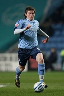 Images Dated 9th February 2010: Championship Showdown: Aron Gunnarsson's Battle at Ricoh Arena
