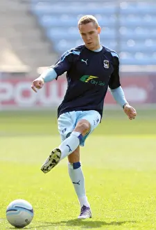 Images Dated 2012 March: Championship Showdown: Coventry City vs Portsmouth - Chris Hussey in Action (24-03-2012)
