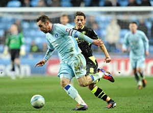 14-02-2012 V Leeds United, Ricoh Arena Prints: Championship Showdown: Keogh vs. Brown - A Football Rivalry at Ricoh Arena
