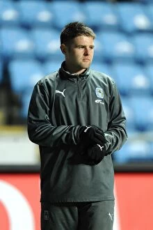 Images Dated 14th February 2012: Championship Showdown: Oliver Norwood vs Leeds United at Ricoh Arena (February 14, 2012)
