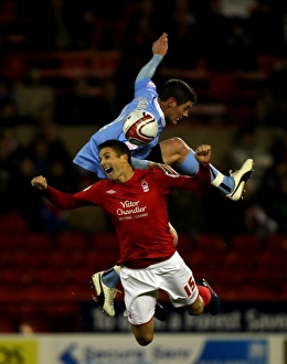 Images Dated 2010: Chris Cohen vs. Lukas Jutkiewicz: A Championship Clash at Nottingham Forest's City Ground (Coventry City vs)
