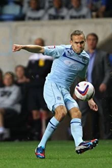 Images Dated 28th August 2012: Chris Hussey in Action: Coventry City vs Birmingham City - Capital One Cup Second Round Clash at