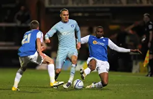 Images Dated 2011 December: Chris Hussey vs. Daniel Kearns and Emile Sinclair: Intense Battle in Coventry City vs
