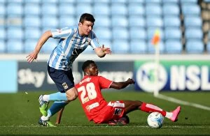 Images Dated 19th September 2015: Chris Stokes: Coventry City's Masterful Evasion of Chesterfield's Gboly Ariyibi (Sky Bet League One)