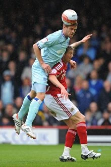 Images Dated 9th April 2012: Clash at Ashton Gate: A Battle Between Bristol City and Coventry City in the Npower Championship