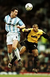 Clash at the Coventry: Roussel vs. Cole - A Premier League Battle (03-02-2001)