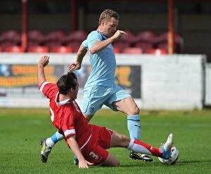 Images Dated 4th August 2012: Clash at Crown Ground: Cody McDonald Foul by Michael Liddle (Coventry City vs Accrington Stanley)