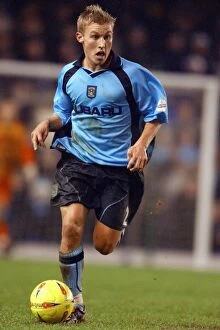 Images Dated 22nd December 2002: Clash in Division One: Coventry City vs Derby County (21-12-2002) - Craig Pead's Intense Moment