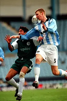 Images Dated 2001: Clash on the Field: Davenport vs Ullah - Coventry City vs Pakistan Friendly