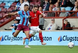 Sky Bet League One - Scunthorpe United v Coventry City - Glanford Park Collection: Clash at Glanford Park: Jordan Clarke vs. Adam Armstrong - Sky Bet League One Rivalry
