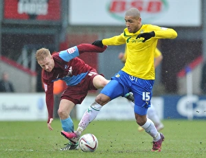 Images Dated 2013 March: Clash at Glanford Park: Leon Clarke vs Mark Duffy - Coventry City vs Scunthorpe United