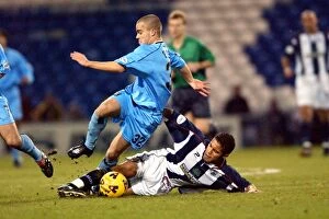 Images Dated 12th December 2001: Clash at The Hawthorns: Fowler vs. Chambers - West Bromwich Albion vs