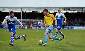 Images Dated 28th March 2015: Clash at London Road: A Battle for Supremacy - Chris Stokes vs Michael Smith (Sky Bet League One)