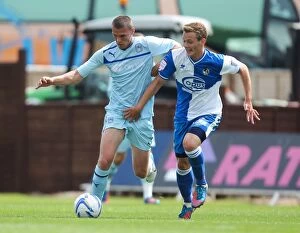 Images Dated 11th August 2012: Clash at Memorial Ground: A Battle Between Seanan Clucas and Billy Daniels