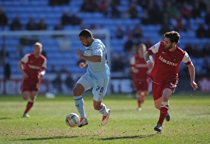 Images Dated 2013 April: Clash of the Midfield Maestros: Wilson vs Vincelot (Coventry City vs Leyton Orient)
