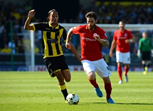 Images Dated 2015 September: Clash at Pirelli Stadium: A Battle Between Nasser El Khayati and Romain Vincelot in Sky Bet League One