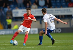 Images Dated 2015 September: Clash on the Pitch: A Sky Bet League One Battle between Romain Vincelot and Danny Pugh at Gigg Lane